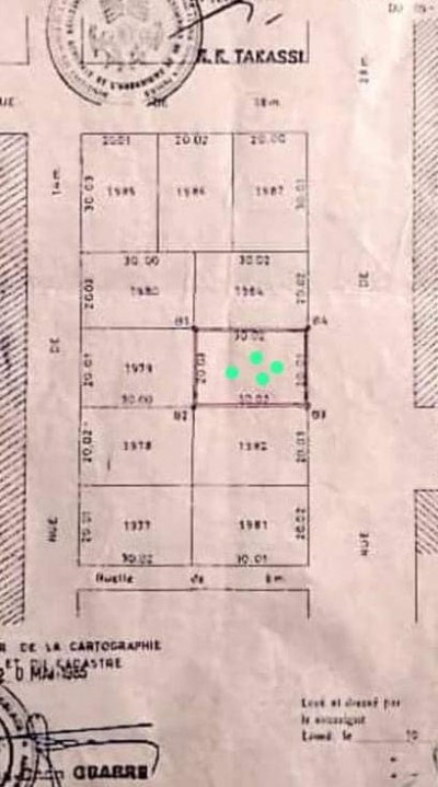 1 lot stratégique avec titre foncier en cours à 200m du goudron
